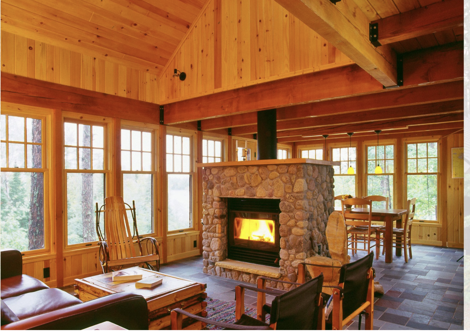 The sitting room, centred around a wood burning stove, in the cabin of cabinologist Dale Mulfinger.